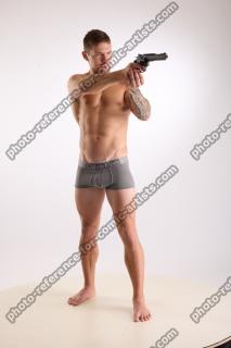 Piero Pose With Revolver